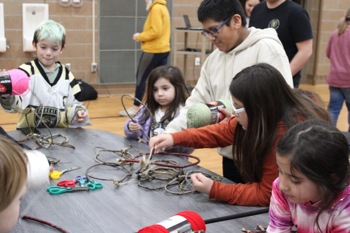 Students from Solheim Elementary School chose which beads to use for their dreamcatcher on Dec. 18. Photo credit/ Adrianna Adame