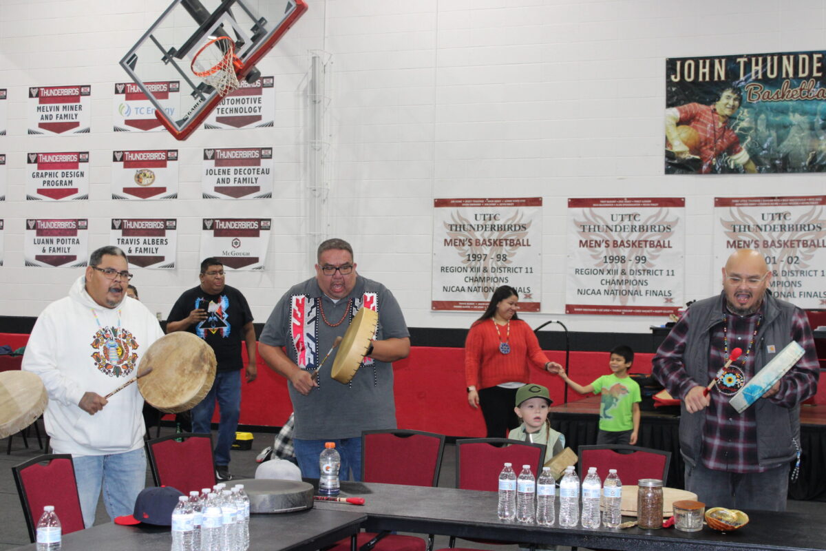 Opie Day performed a set of hand drum songs before passing four sticks and tobacco to another singer on Dec. 9. Photo credit/ Adrianna Adame