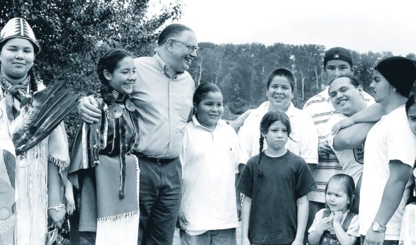 Terry Cross with a group of children attending a NICWA-sponsored community gathering in 2001. (Photo provided by the National Indian Child Welfare Association.)