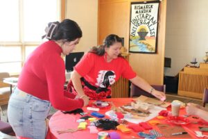 Leta Killer (center) came out to the Faceless Doll Project in Bismarck on May 4 to tell the story of her two relatives who had been killed. Photo credit/ Adrianna Adame